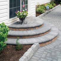 EP Henry steps in Brick Stone, 90° Herringbone Pattern; Bullnose Pavers; Coventry® Curbstone in Pewter Blend